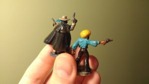 Photograph showing the back of two painted miniatures Horace 'Action' Johnson and The Black Mist