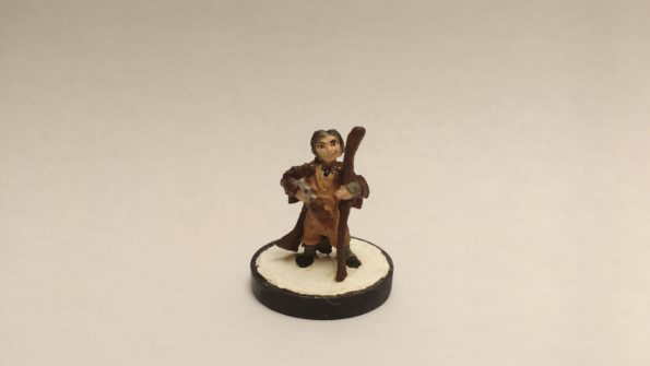 The Lem Iconic Bard miniature from Reaper Bones. Viewed from the front.