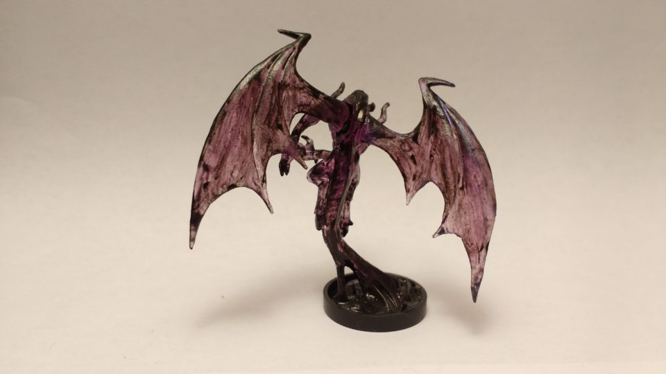 The Shadow Demon miniature from Reaper Bones. Viewed from the back.