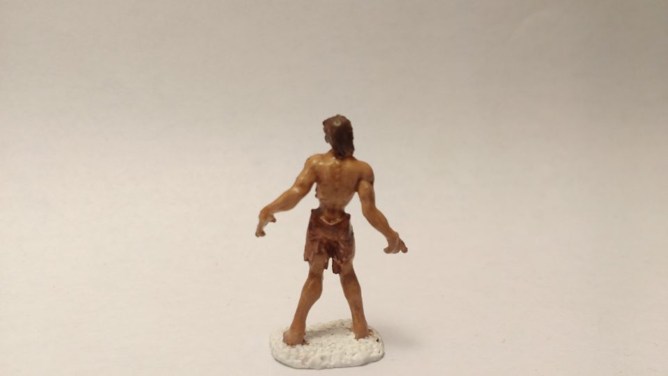 Zombie miniature from Reaper Bones. Viewed from back.