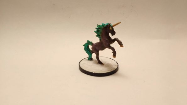 The Starmane Unicorn miniature from Reaper Dark Heaven Legends